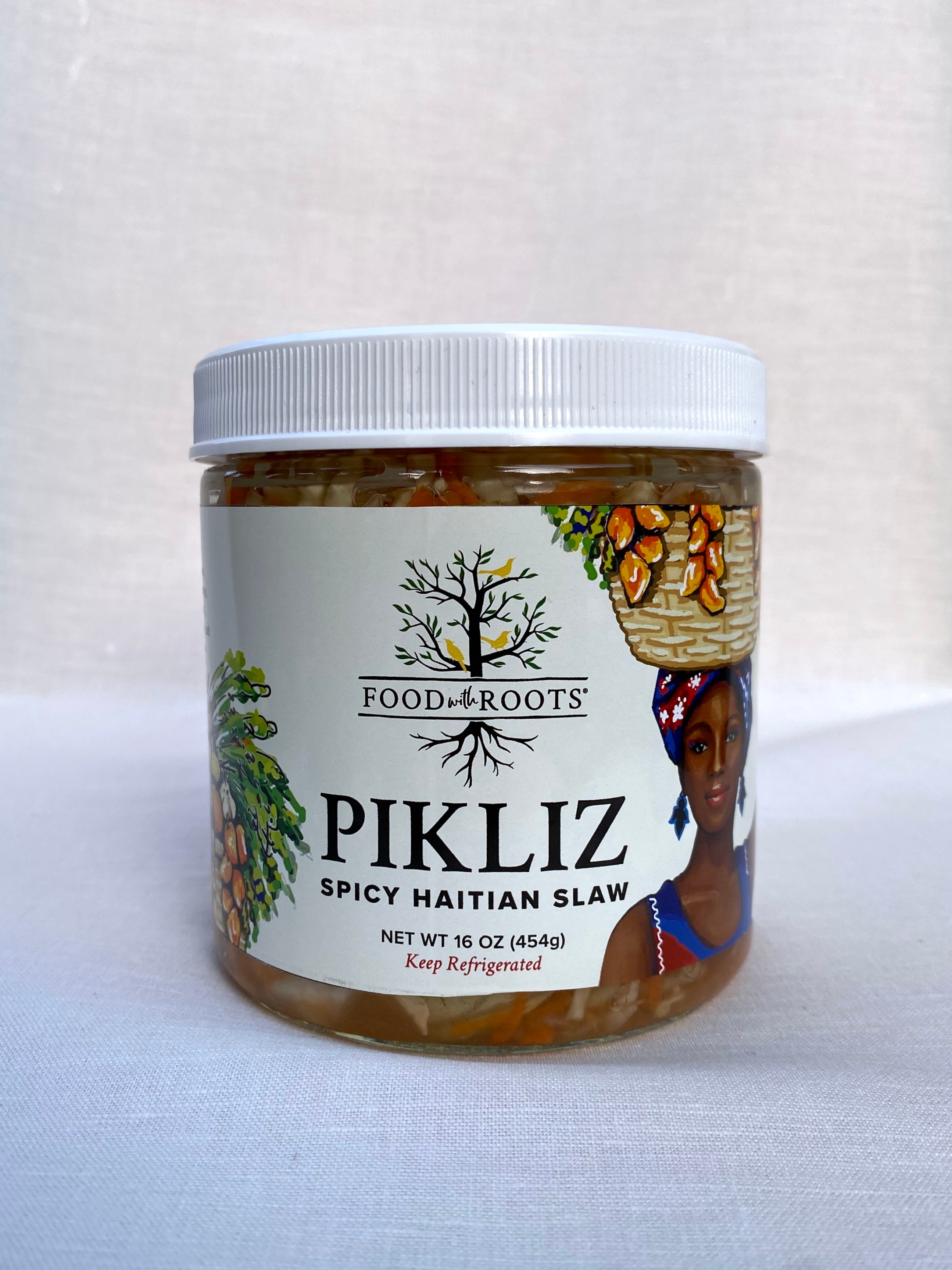 Front of pikliz label with Food with Roots logo and Spicy Haitian Slaw underneath 